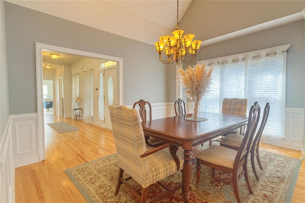 2014 Hubbard Court Villa Rica, GA 30180 - Photo 20 of 41 a view of a dining room with furniture and chandelier