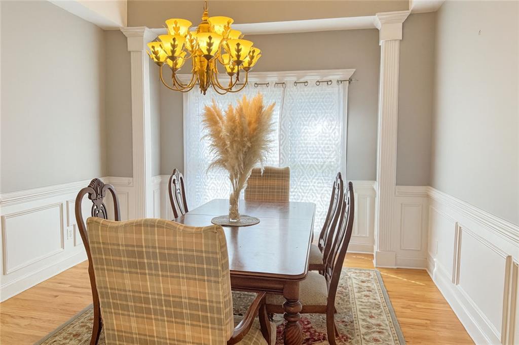 2014 Hubbard Court Villa Rica, GA 30180 - Photo 21 of 41 a view of a dining room with furniture and a chandelier