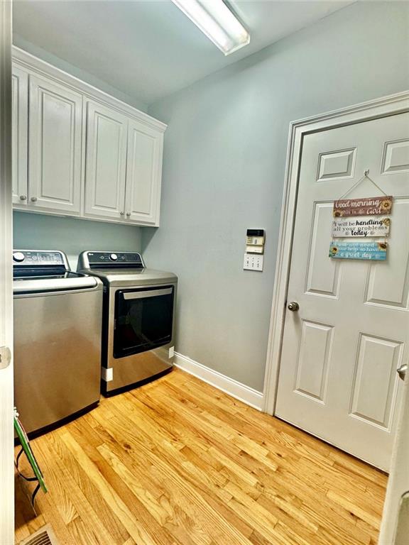 2014 Hubbard Court Villa Rica, GA 30180 - Photo 22 of 41 a bedroom with a bed and a cabinets