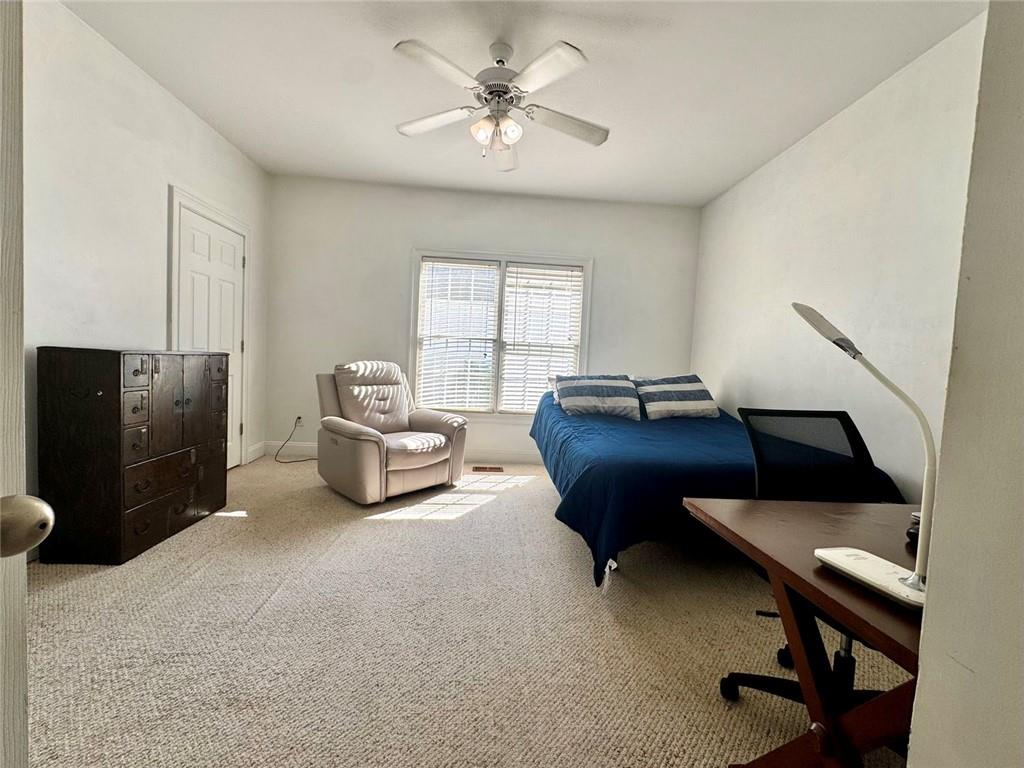2014 Hubbard Court Villa Rica, GA 30180 - Photo 25 of 41 a living room with furniture and a air conditioner vent