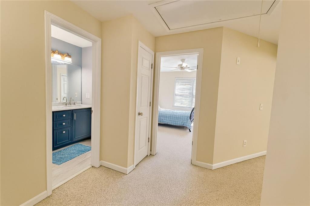 2014 Hubbard Court Villa Rica, GA 30180 - Photo 30 of 41 a view of a bathroom with a sink and mirror