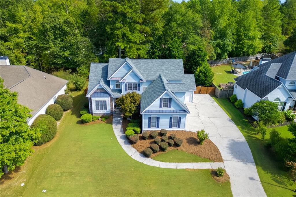 2014 Hubbard Court Villa Rica, GA 30180 - Photo 3 of 41 an aerial view of a house with garden space and street view