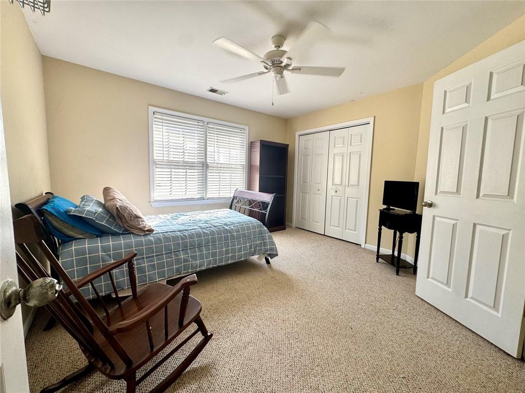 2014 Hubbard Court Villa Rica, GA 30180 - Photo 31 of 41 a bedroom with a bed window and a table