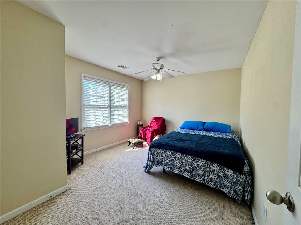 2014 Hubbard Court Villa Rica, GA 30180 - Photo 33 of 41 a bedroom with a bed and a window