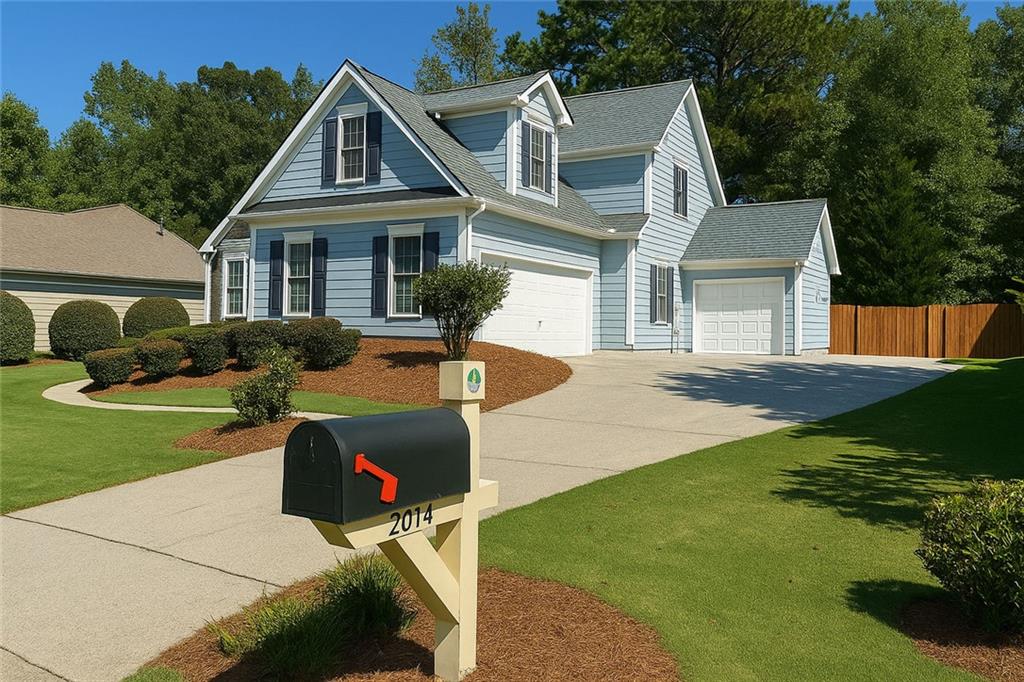 2014 Hubbard Court Villa Rica, GA 30180 - Photo 5 of 41 a front view of a house with garden