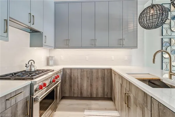 a utility room with sink dryer and washer