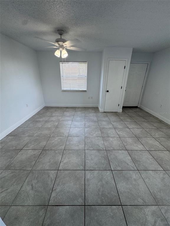 1195 Bentley Road, Unit 1 Leesburg, FL 34748 - Photo 9 of 13 a view of an empty room with a window