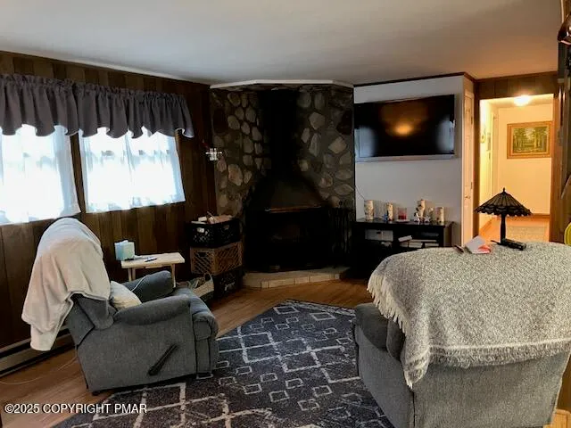 a living room with a couch and a flat screen tv