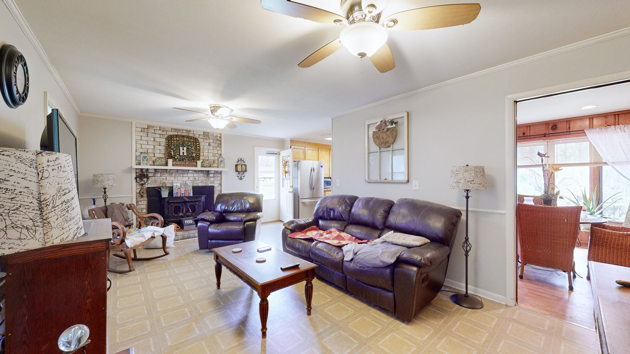 209 Bellwood Circle Dickson, TN 37055 - Photo 11 of 53 a living room with furniture a fireplace and a large window