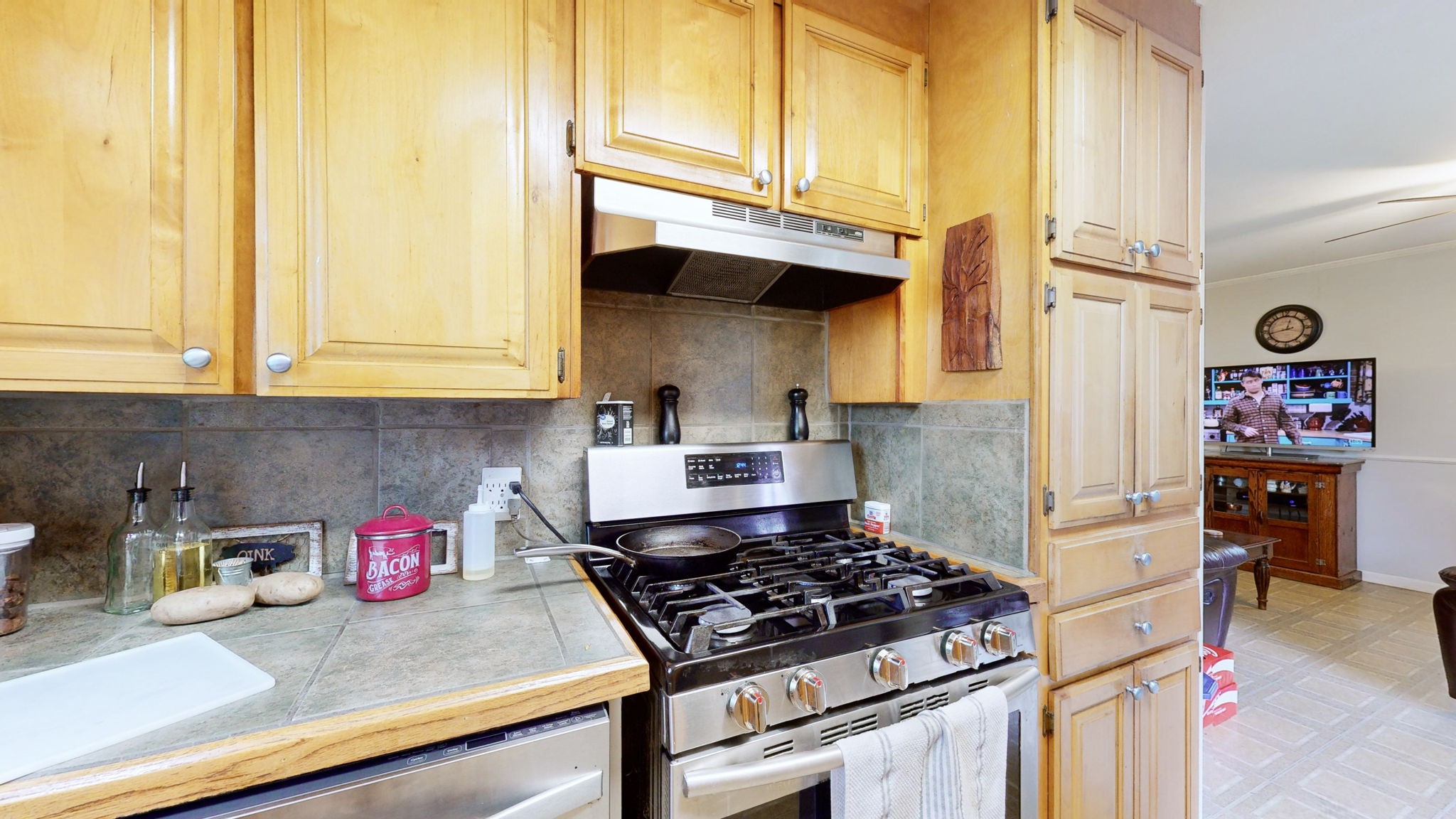 209 Bellwood Circle Dickson, TN 37055 - Photo 13 of 53 a kitchen with stainless steel appliances granite countertop a stove and a sink