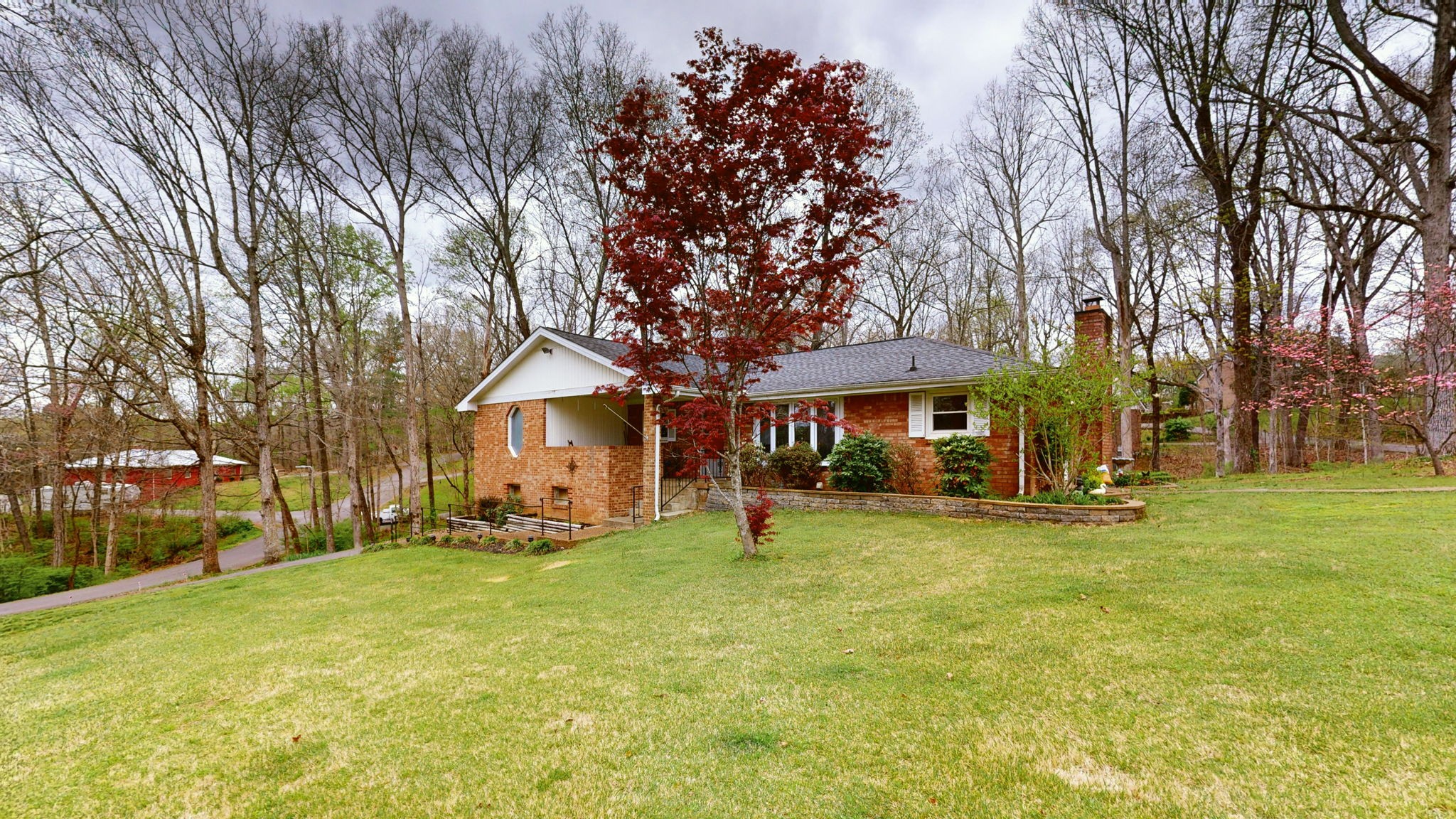 209 Bellwood Circle Dickson, TN 37055 - Photo 2 of 53 a view of a house with a big yard and large trees