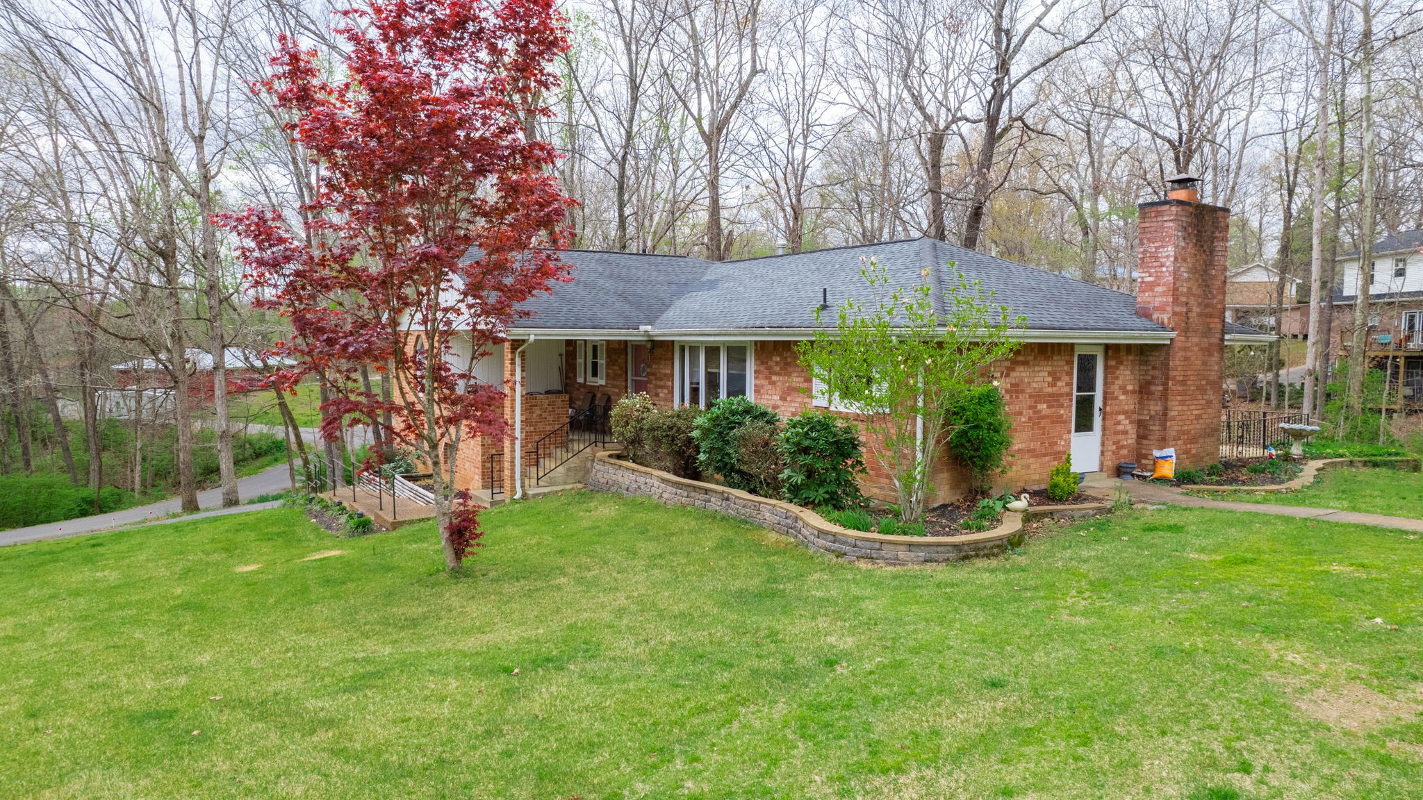 209 Bellwood Circle Dickson, TN 37055 - Photo 3 of 53 a front view of a house with a yard