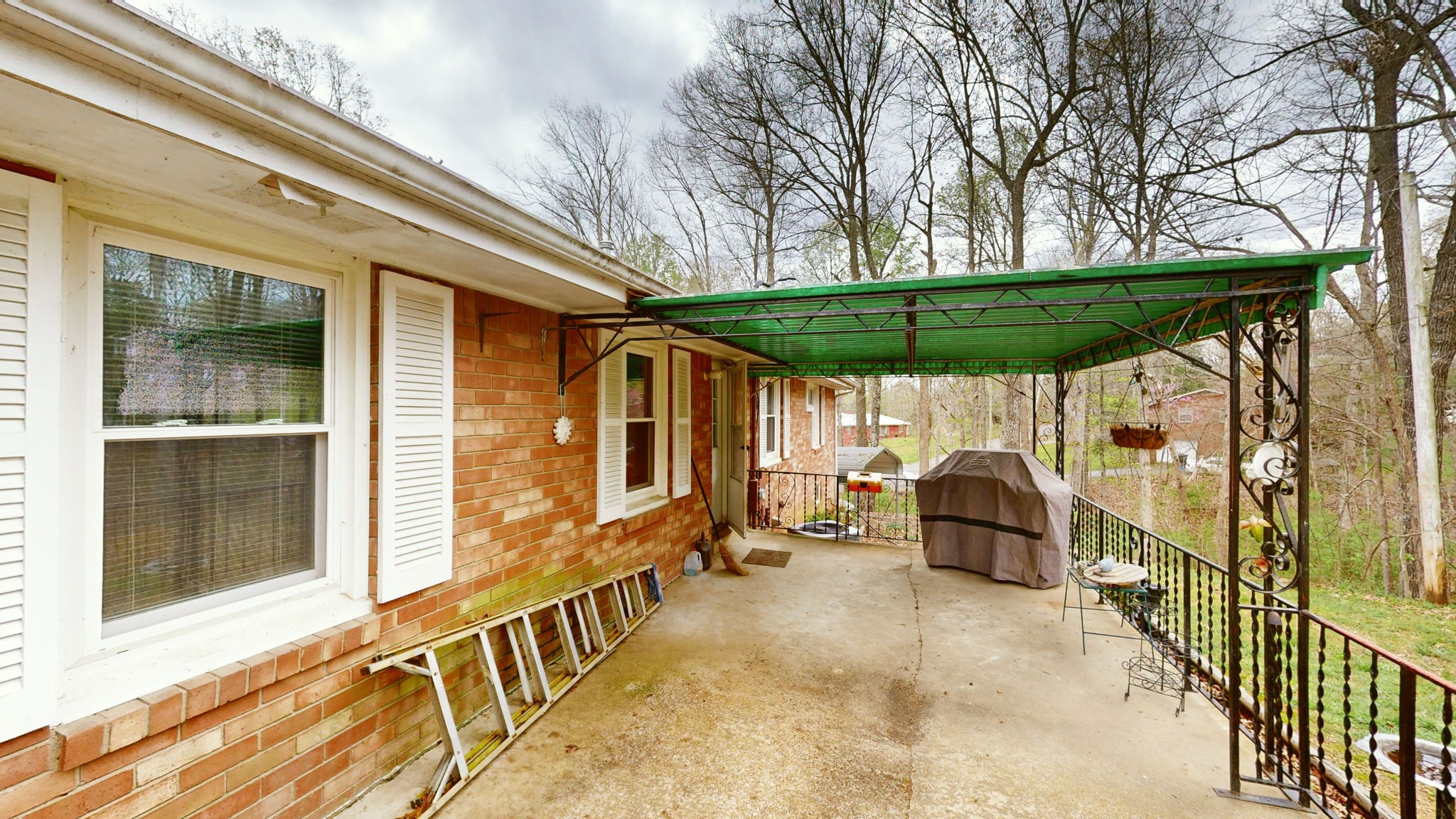 209 Bellwood Circle Dickson, TN 37055 - Photo 39 of 53 a backyard of a house with barbeque oven table and chairs