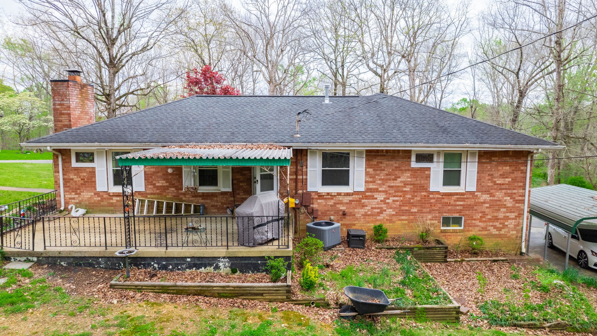 209 Bellwood Circle Dickson, TN 37055 - Photo 41 of 53 a front view of house with yard outdoor seating and barbeque oven