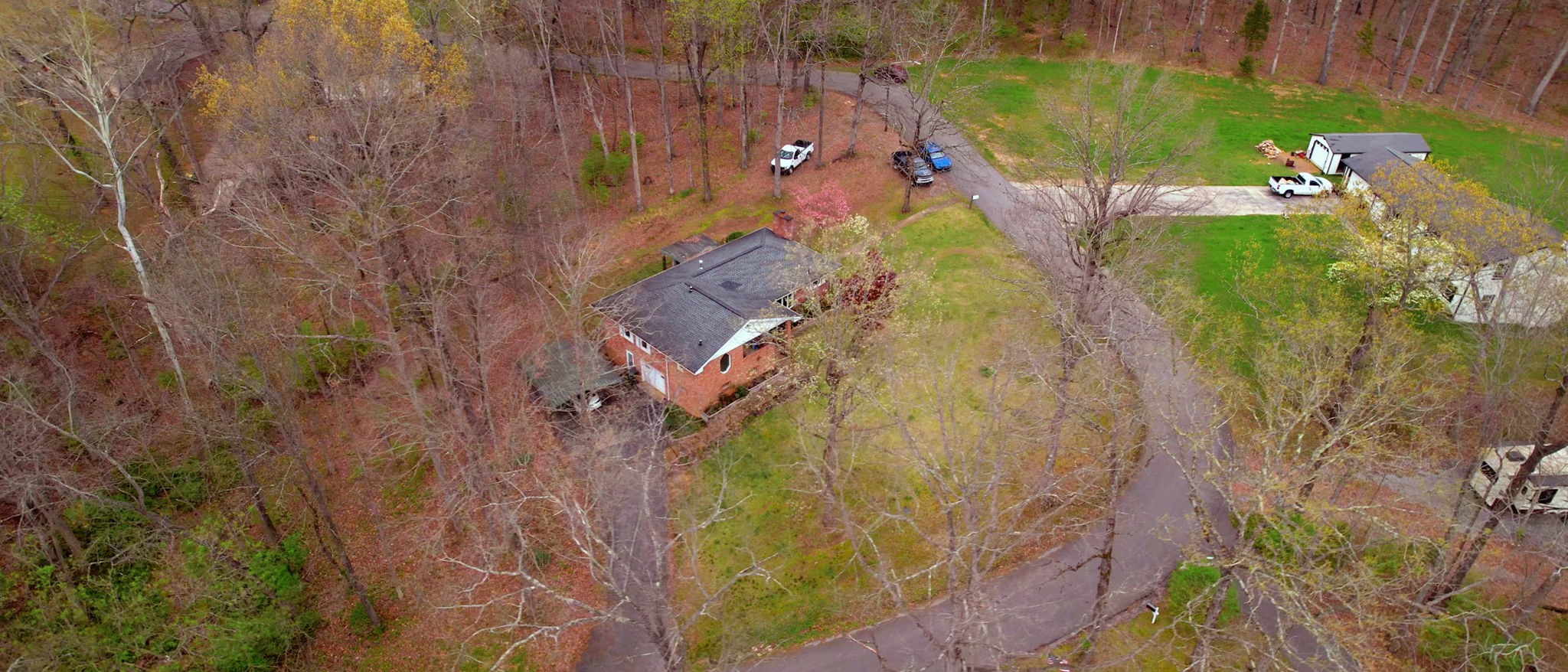 209 Bellwood Circle Dickson, TN 37055 - Photo 51 of 53 a aerial view of a house with a yard and garden