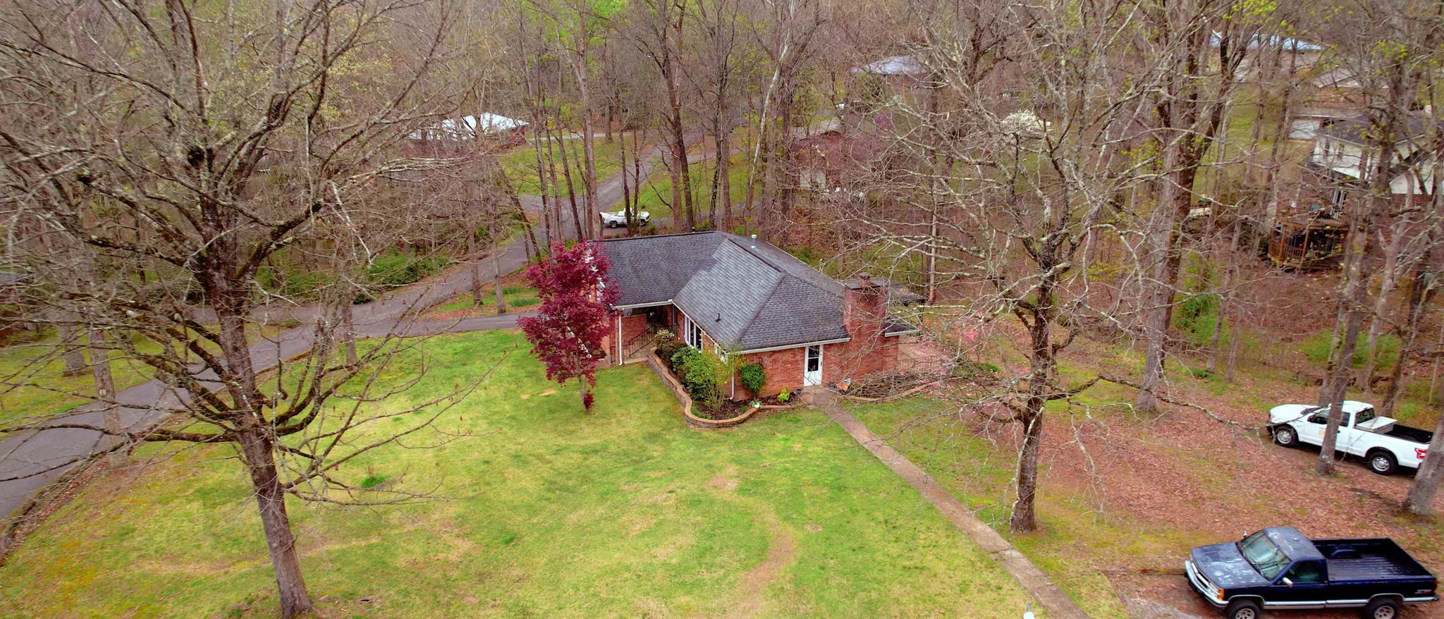 209 Bellwood Circle Dickson, TN 37055 - Photo 52 of 53 a view of backyard with swimming pool and seating area