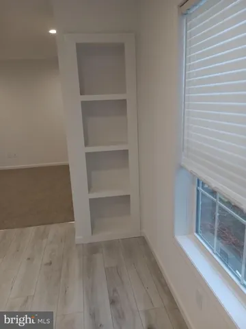 a view of an empty walk in closet
