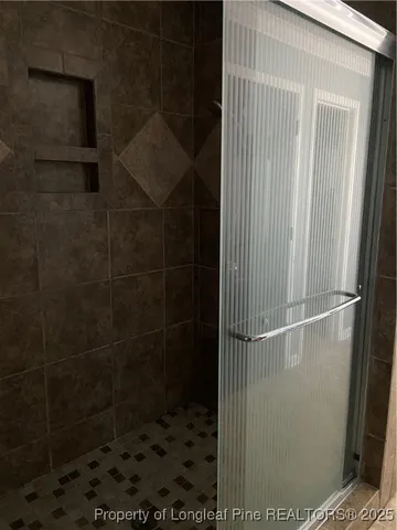 a bathroom with a mirror