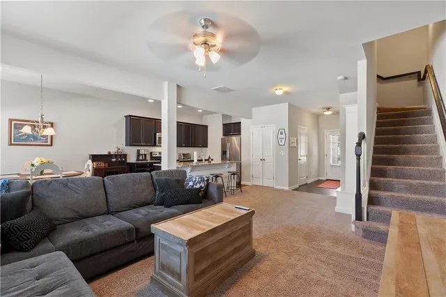 a bedroom with a bed and a workspace