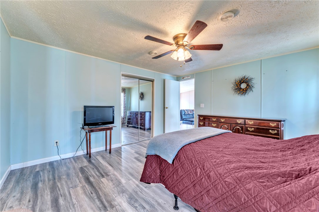 137 East Reedy Fork Road Seneca, SC 29678 - Photo 14 of 28 This bedroom offers ample space, a comfortable ambiance, and practical features for everyday living.