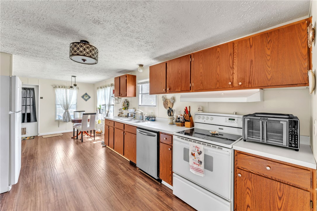 137 East Reedy Fork Road Seneca, SC 29678 - Photo 4 of 28 This bright kitchen features ample cabinetry and a functional layout, perfect for everyday living.