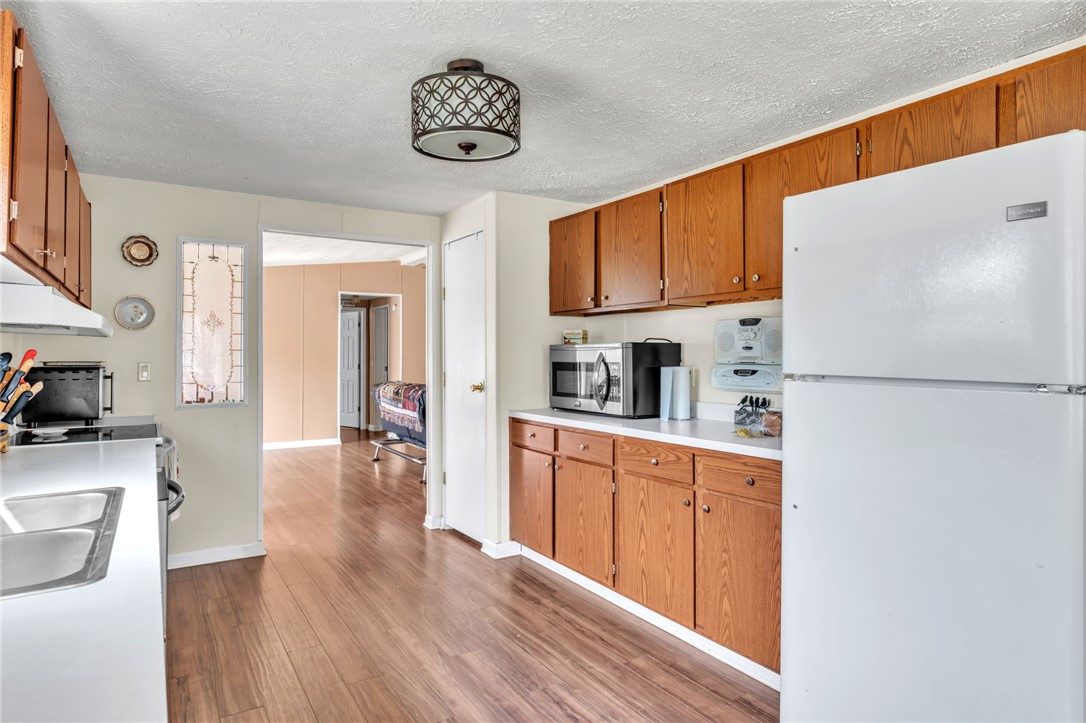 137 East Reedy Fork Road Seneca, SC 29678 - Photo 7 of 28 This functional kitchen features ample cabinetry and a bright, welcoming atmosphere.
