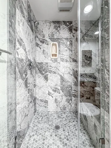 a view of a livingroom with a fireplace