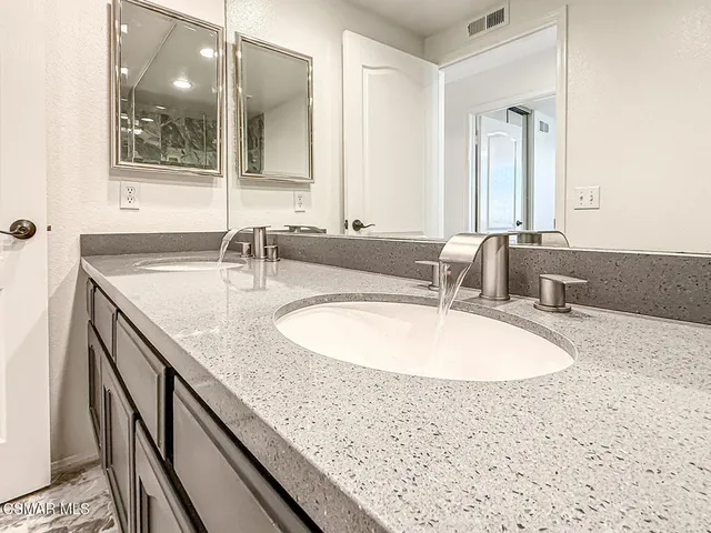 a view of a swimming pool with a yard