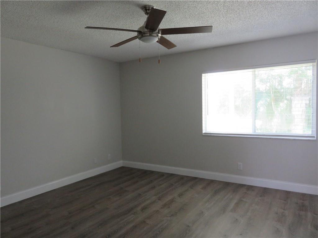 9764 Kamena Circle Boynton Beach, FL 33436 - Photo 11 of 18 an empty room with a window