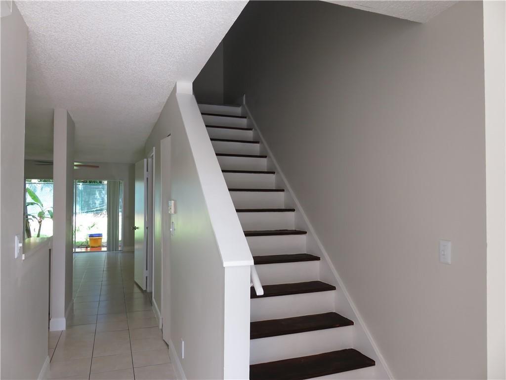 9764 Kamena Circle Boynton Beach, FL 33436 - Photo 7 of 18 a view of entryway and hall with wooden floor
