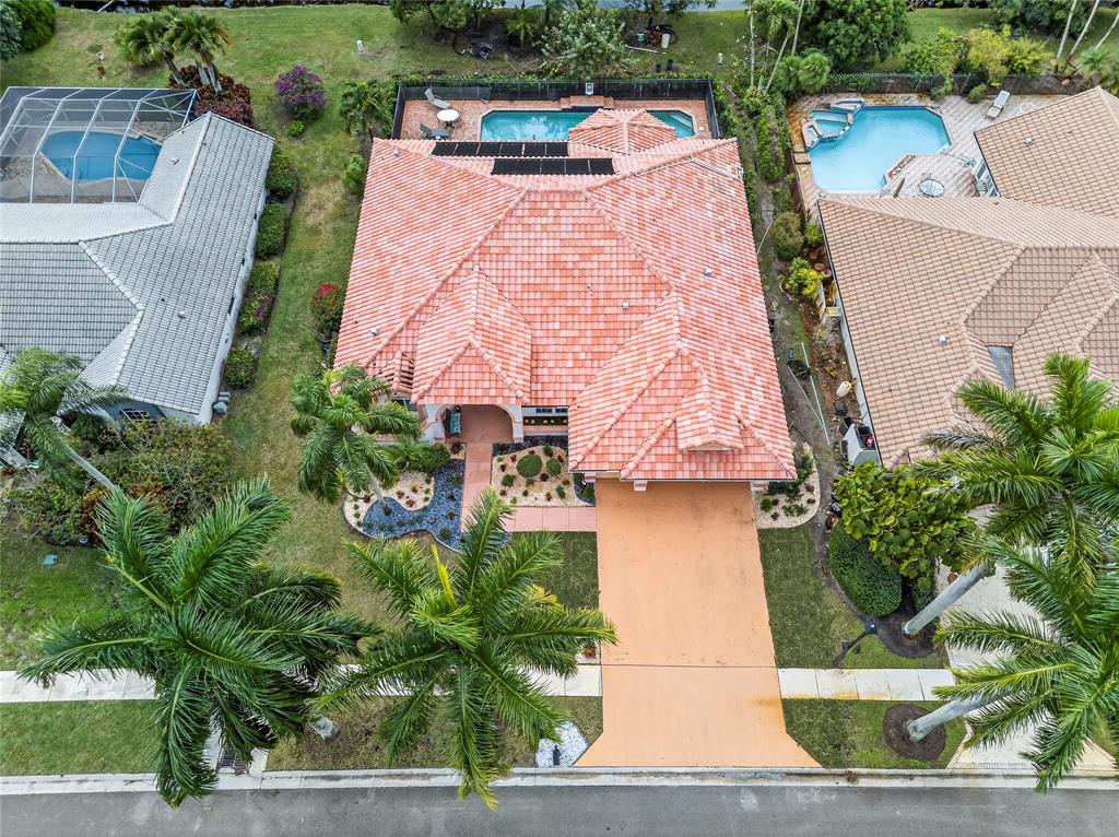 10405 Canoe Brook Circle Boca Raton, FL 33498 - Photo 53 of 56 an aerial view of a house with garden space and street view