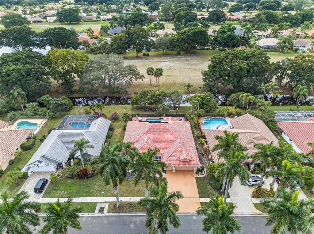 10405 Canoe Brook Circle Boca Raton, FL 33498 - Photo 54 of 56 an aerial view of a houses with yard
