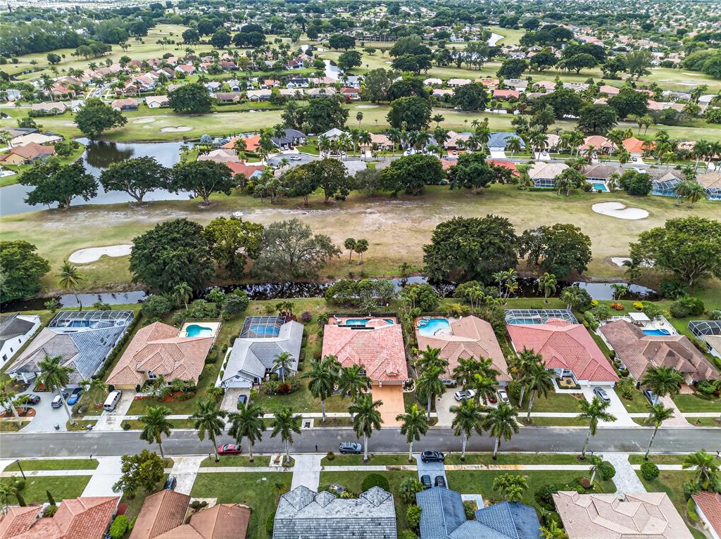 10405 Canoe Brook Circle Boca Raton, FL 33498 - Photo 55 of 56 an aerial view of residential houses with outdoor space and lake view