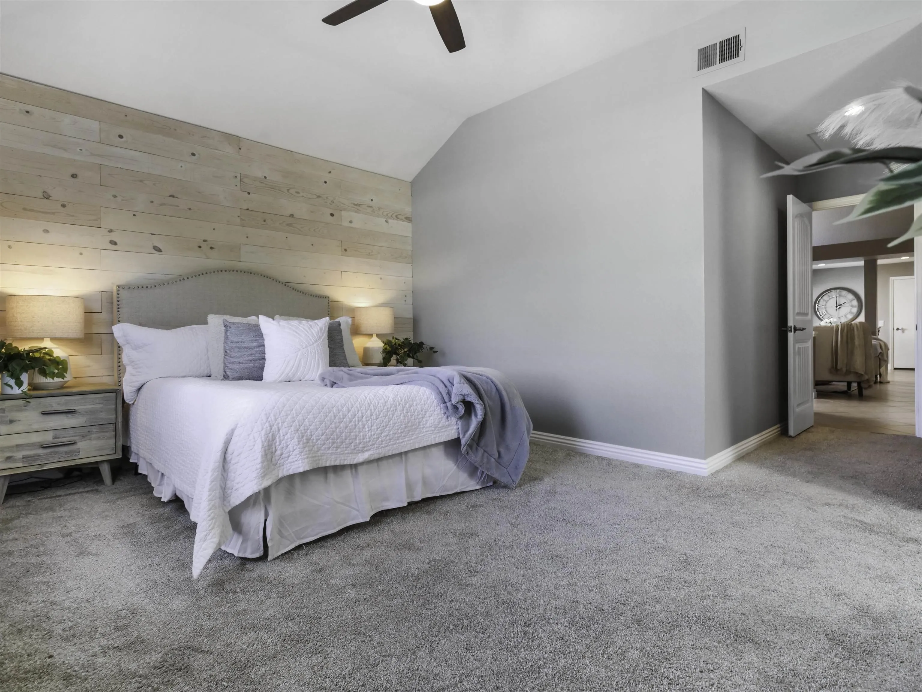 809 Sandbar Way Carlsbad, CA 92011 - Photo 17 of 39 a bedroom with a bed and a table