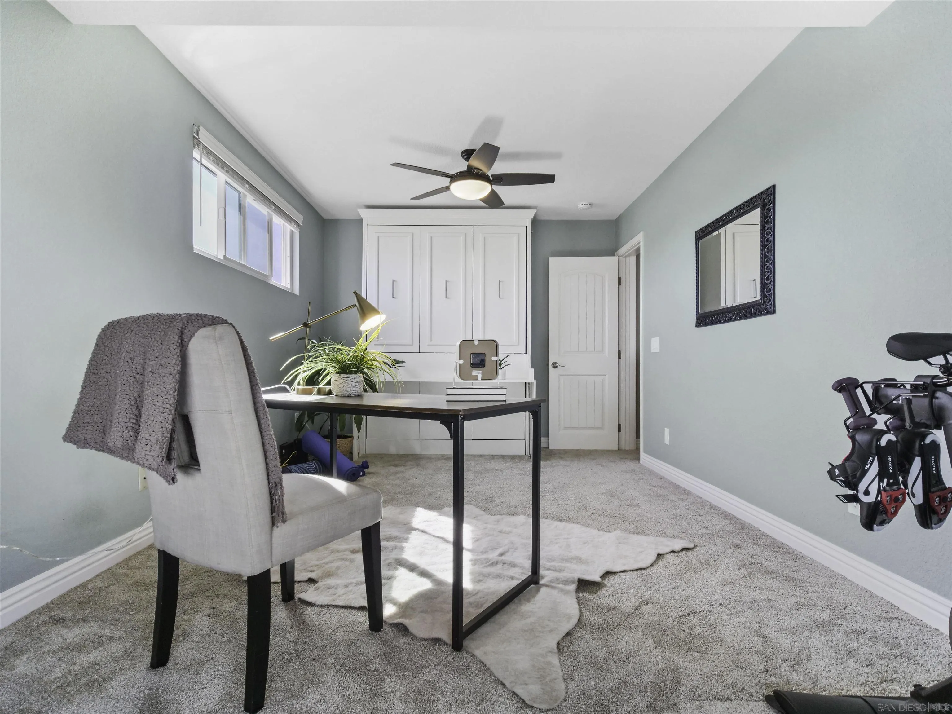 809 Sandbar Way Carlsbad, CA 92011 - Photo 30 of 39 a view of a livingroom with furniture and a couch