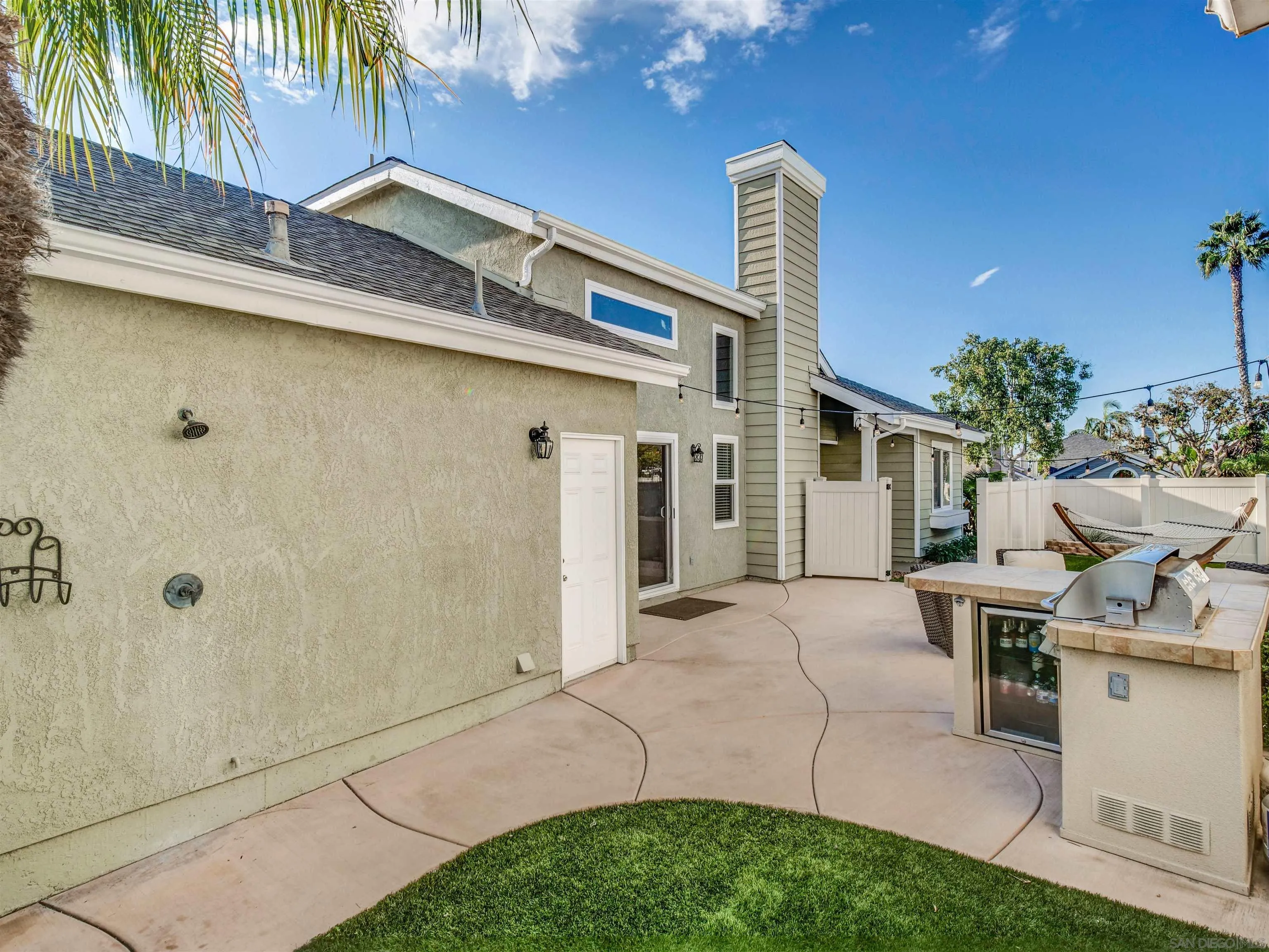 809 Sandbar Way Carlsbad, CA 92011 - Photo 35 of 39 a backyard of a house with seating space