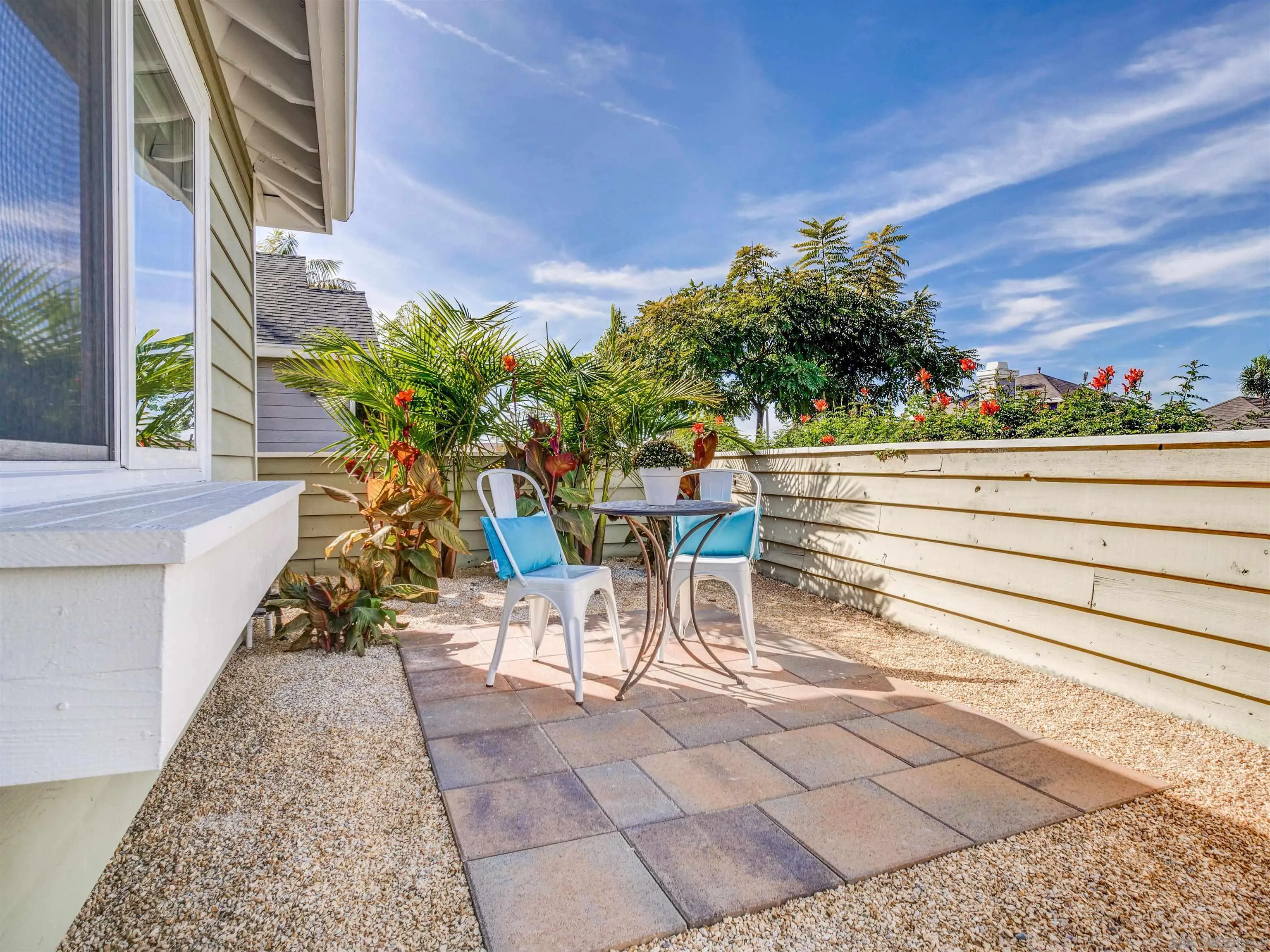 809 Sandbar Way Carlsbad, CA 92011 - Photo 37 of 39 a view of a chairs and table in a patio