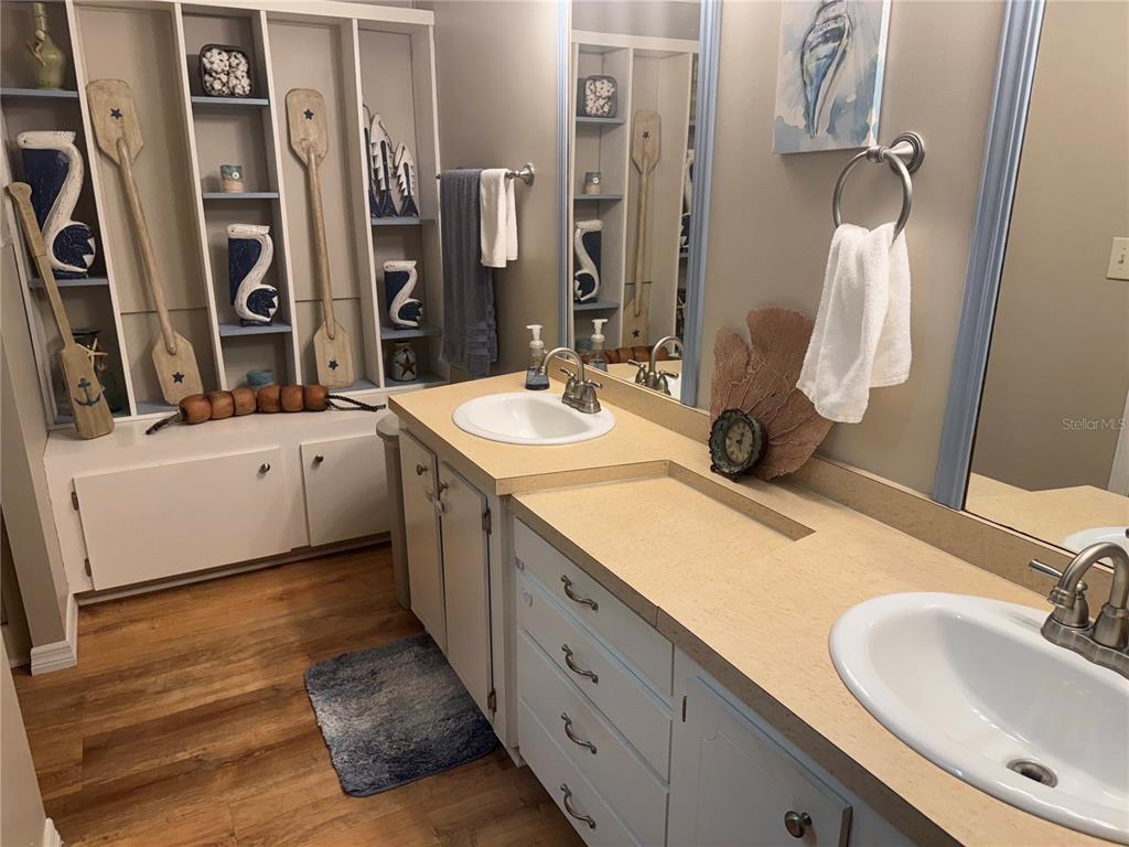 1001 Starkey Road, Unit 310 Largo, FL 33771 - Photo 19 of 25 a bathroom with double vanity sink and a mirror