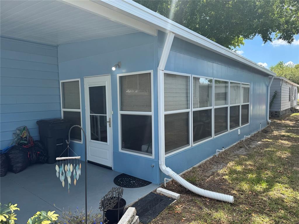 1001 Starkey Road, Unit 310 Largo, FL 33771 - Photo 4 of 25 a view of balcony with chairs