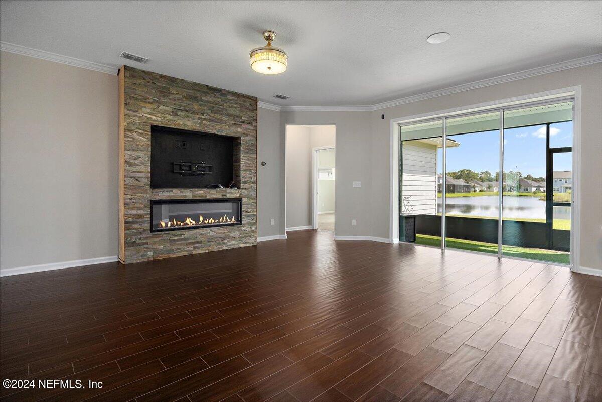 9802 Kevin Road Jacksonville, FL 32257 - Photo 11 of 23 a view of livingroom with furniture wooden floor and window