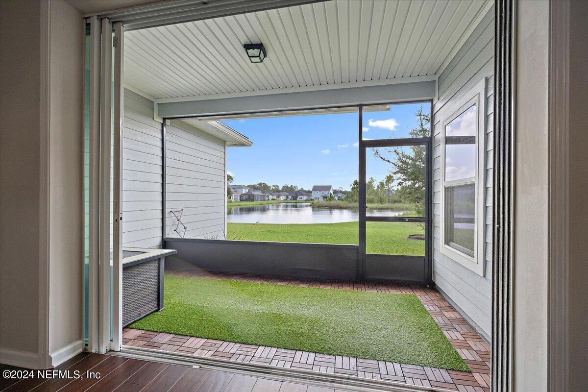 9802 Kevin Road Jacksonville, FL 32257 - Photo 21 of 23 a view of outdoor space with a large window
