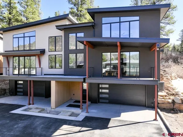 a view of house with outdoor space and porch