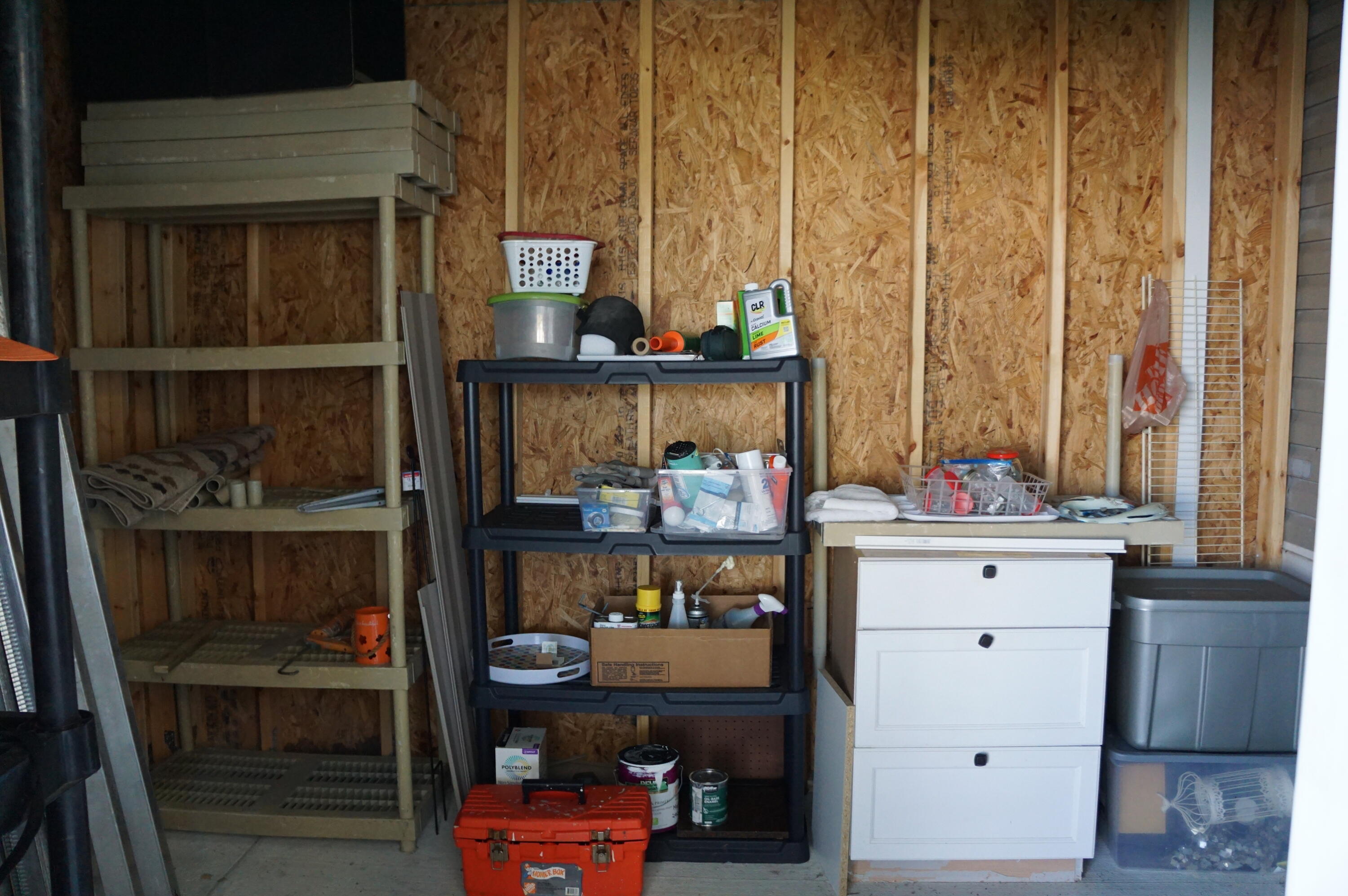 325 Mockingbird Avenue Fort Pierce, FL 34982 - Photo 25 of 39 a room with a wooden floor and shelf