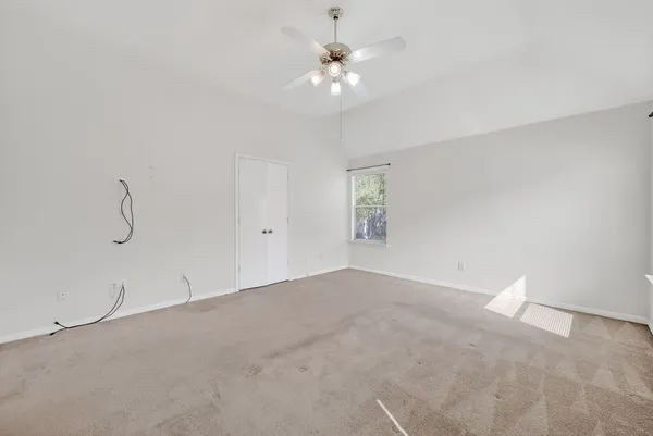 a view of a room with a fan