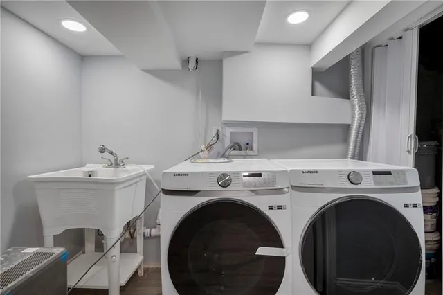 a utility room with dryer and washer