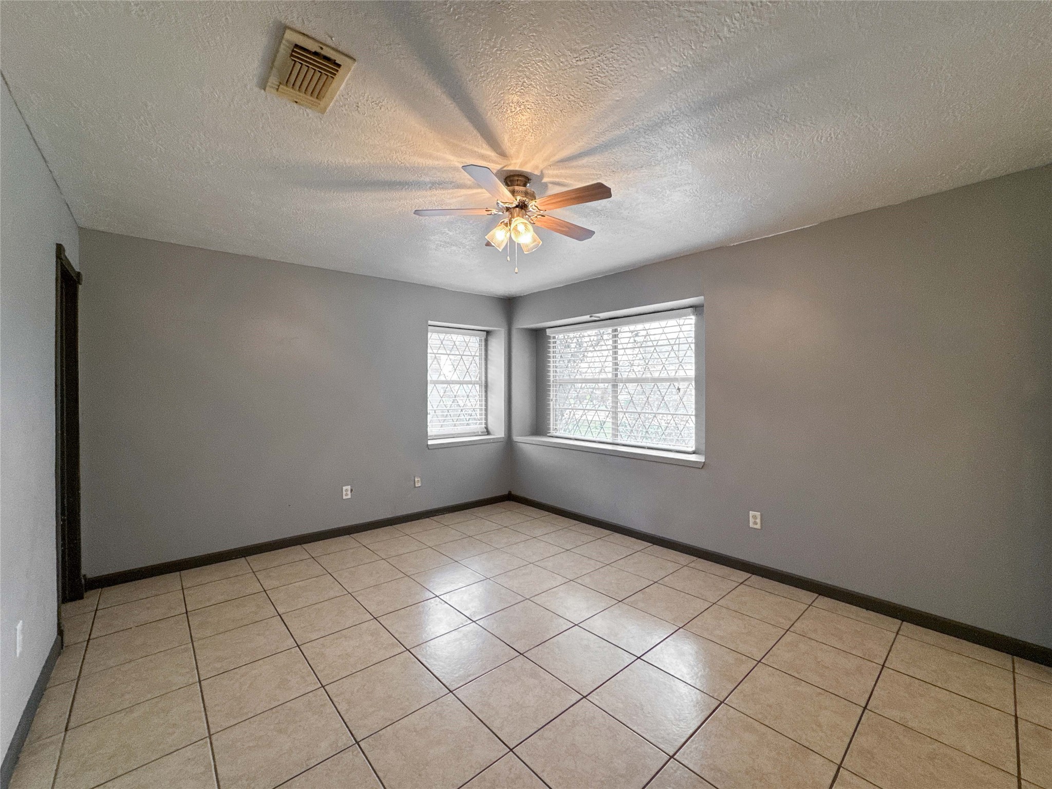 4522 Sage Circle Baytown, TX 77521 - Photo 19 of 33 a view of an empty room with a window
