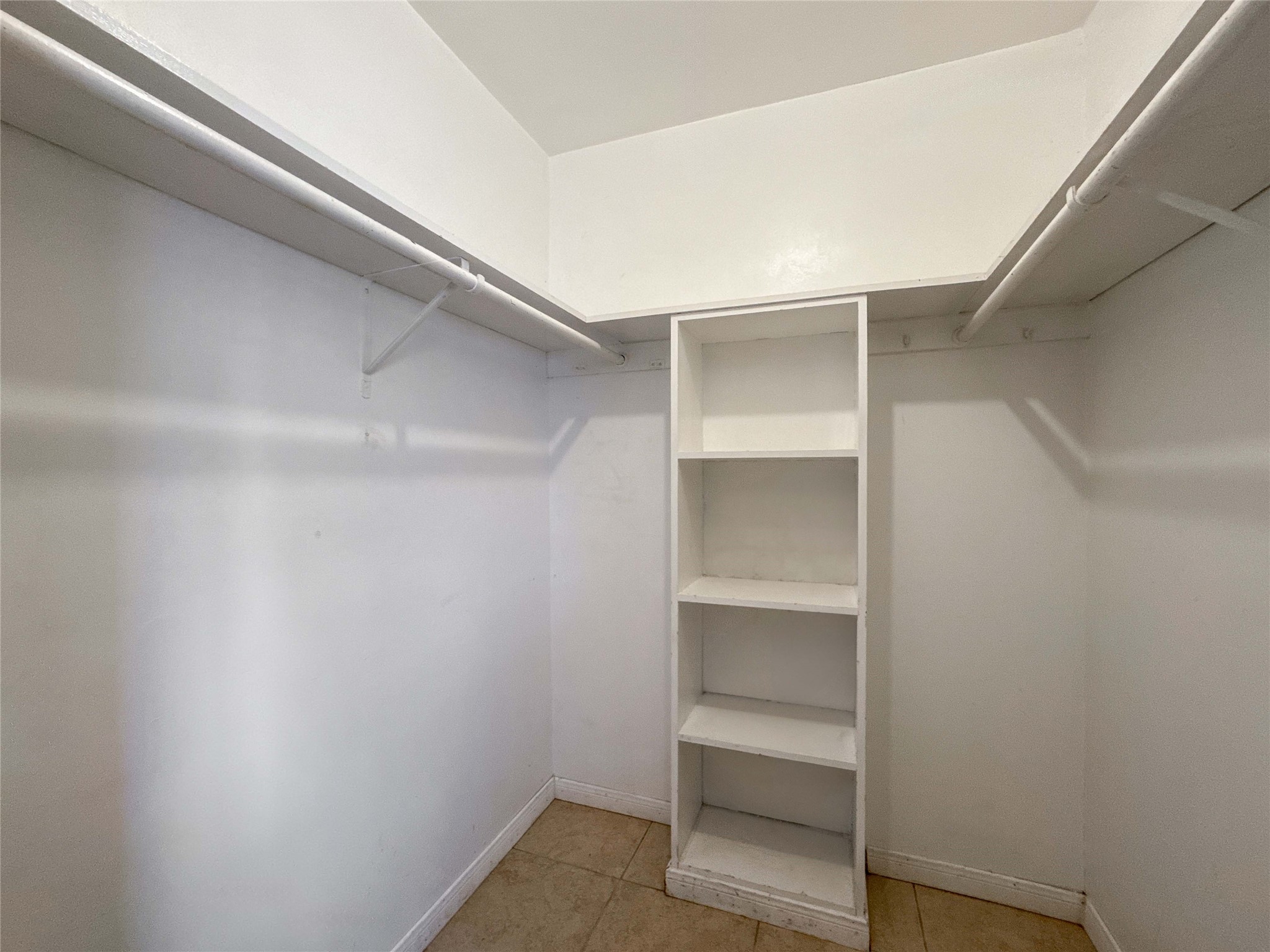 4522 Sage Circle Baytown, TX 77521 - Photo 20 of 33 a view of an empty walk in closet