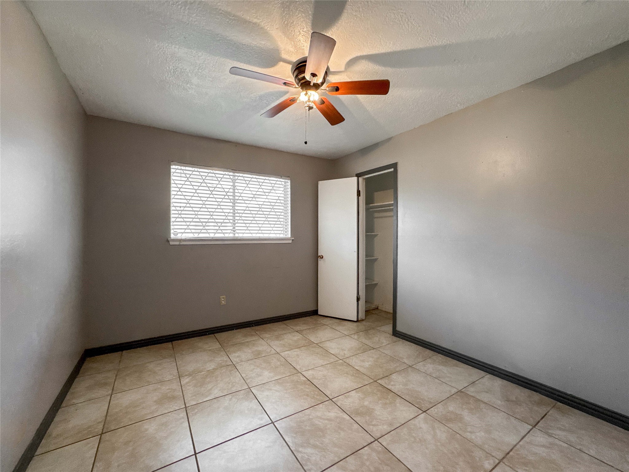4522 Sage Circle Baytown, TX 77521 - Photo 22 of 33 a view of an empty room with a window
