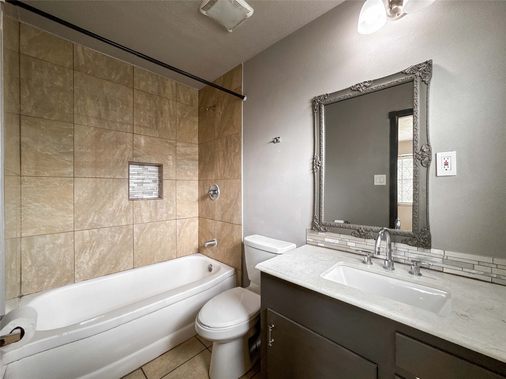 4522 Sage Circle Baytown, TX 77521 - Photo 27 of 33 a bathroom with a sink a toilet and shower