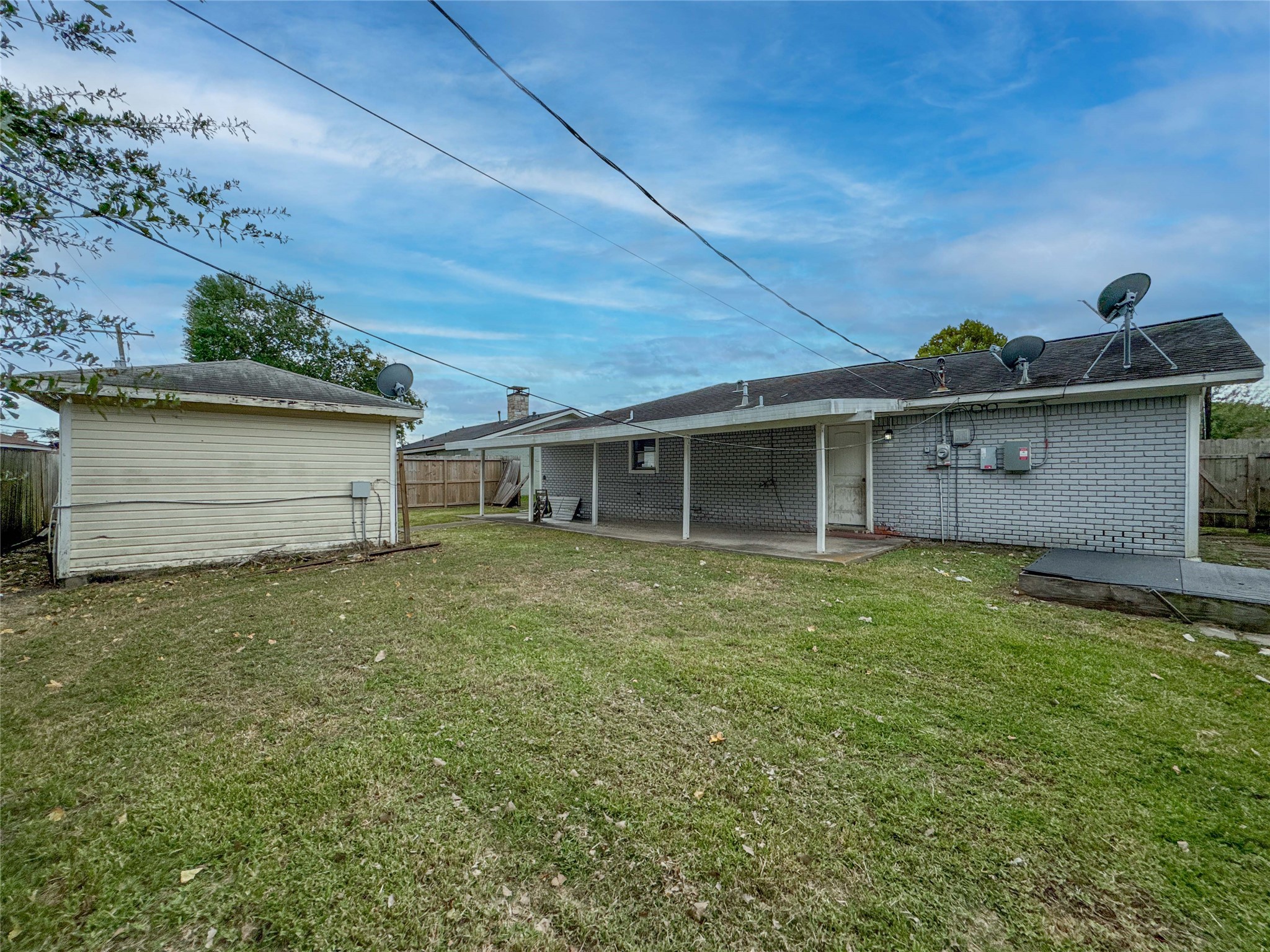 4522 Sage Circle Baytown, TX 77521 - Photo 30 of 33 a front view of a house with a garden